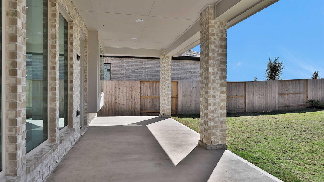 Exterior details and patio area of a home in Meridiana 60', Manvel (Image 3). Exterior details and patio area of a home in Meridiana 60', Manvel (Image 3).