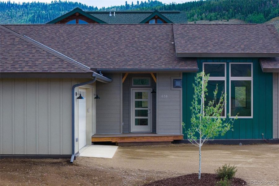 Front exterior of a new home in , Hot Sulphur Springs, CO, highlighting curb appeal (Image 20).