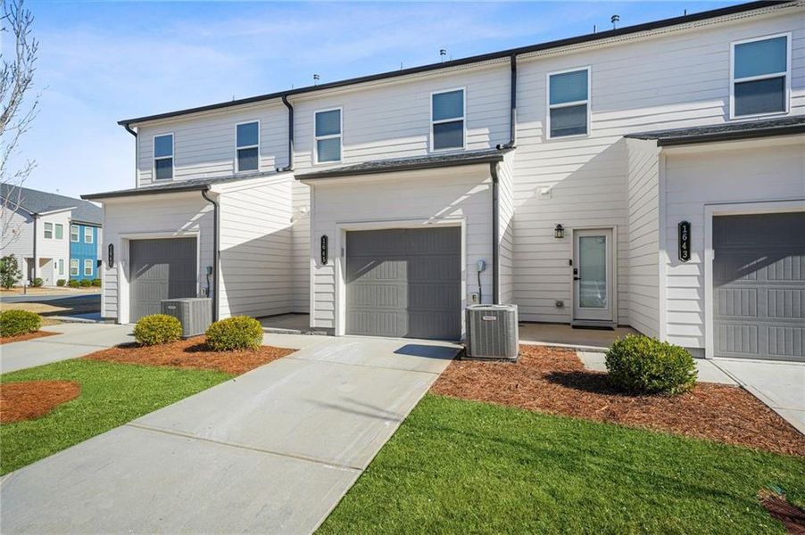 Front exterior of a new home in , Atlanta, GA, highlighting curb appeal (Image 26).