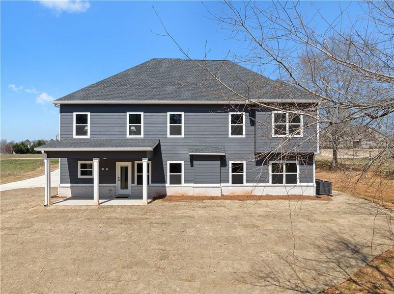 Front exterior of a new home in , Social Circle, GA, highlighting curb appeal (Image 29).