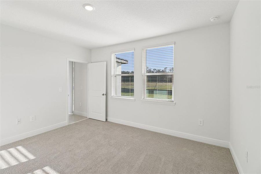 Spacious, unfurnished interior of a new home in The Reserve at Hammock Oaks - Classic Series, Lady Lake (Image 21). Spacious, unfurnished interior of a new home in The Reserve at Hammock Oaks - Classic Series, Lady Lake (Image 21).