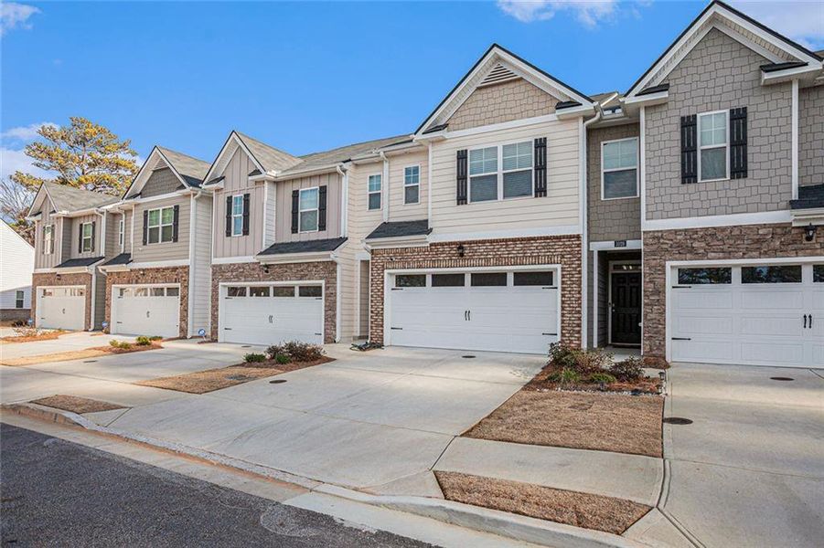 Front exterior of a new home in , Lawrenceville, GA, highlighting curb appeal (Image 20). Front exterior of a new home in , Lawrenceville, GA, highlighting curb appeal (Image 20).