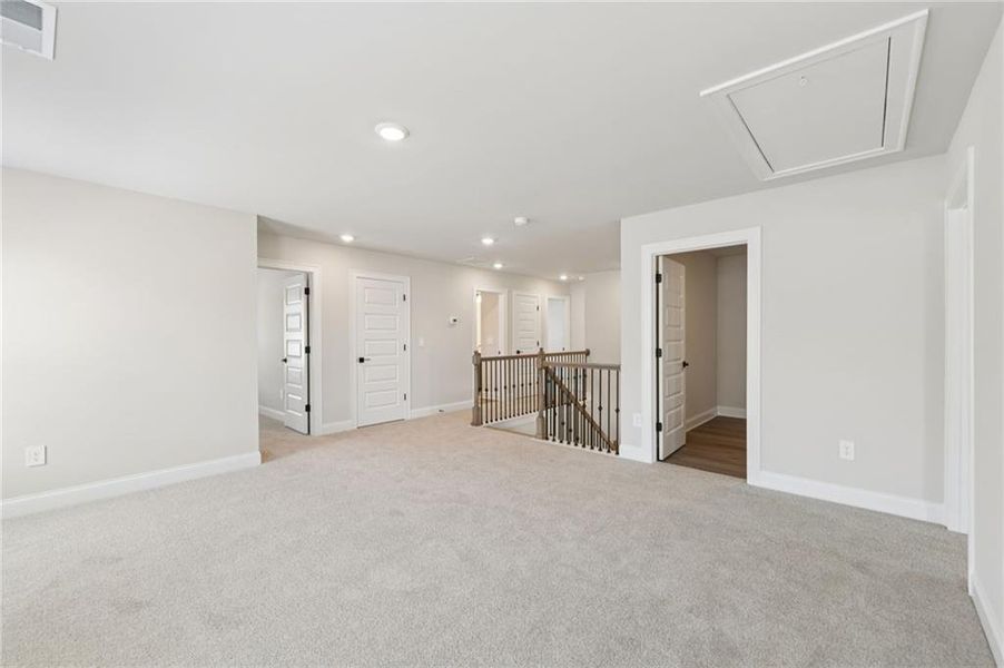 Spacious, unfurnished interior of a new home in Vines at Mill Creek - Estate Series, Braselton (Image 41).
