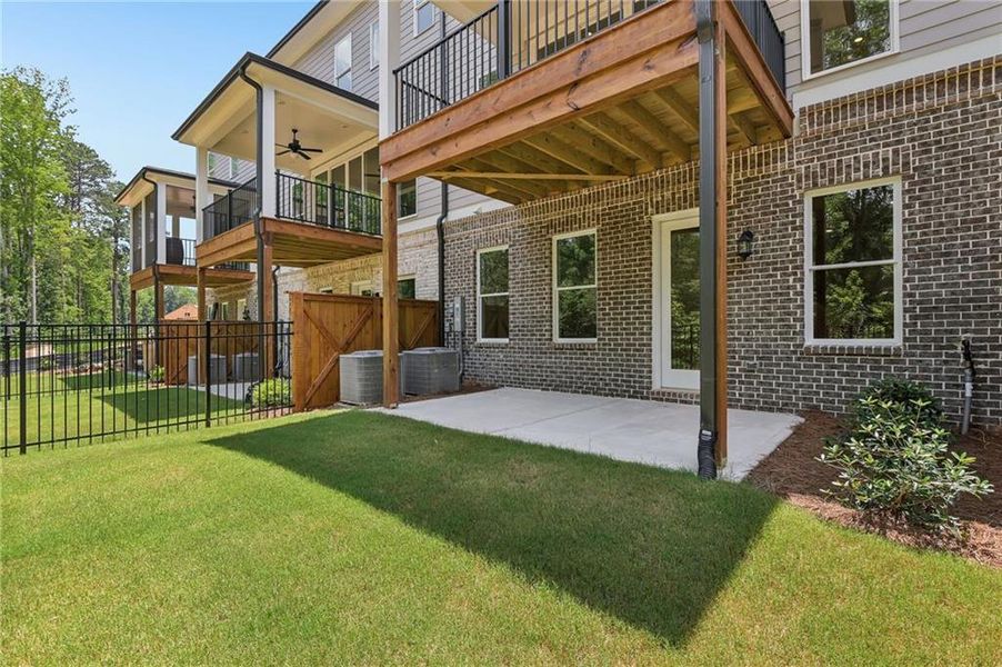 Exterior details and patio area of a home in Waterside Townhomes, Peachtree Corners (Image 3).