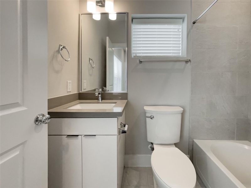 Luxurious ensuite third bathroom, perfect for added privacy and convenience.