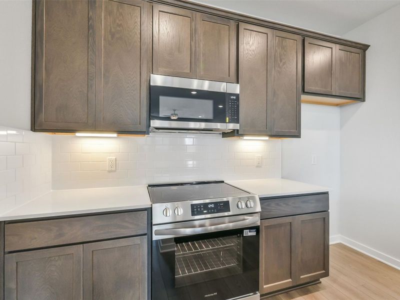 Furnished interior view inside a new home in Spring Branch Crossing, Conroe (Image 15).