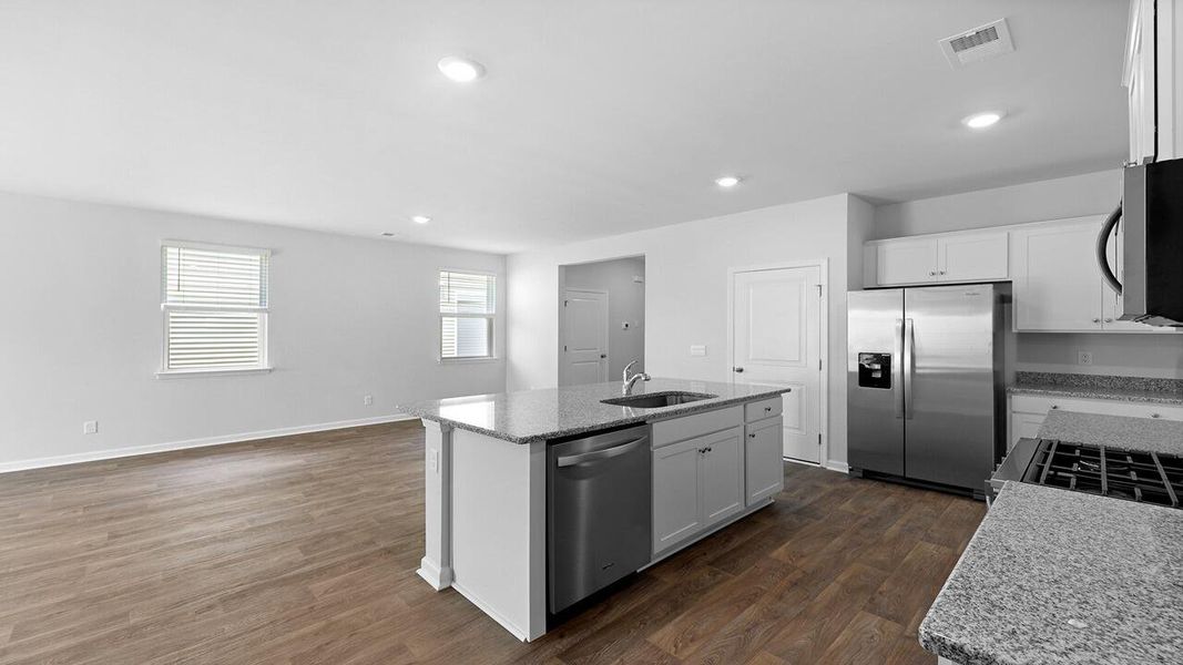 Furnished interior view inside a new home in Pine Hills at Cane Bay, Summerville (Image 9).