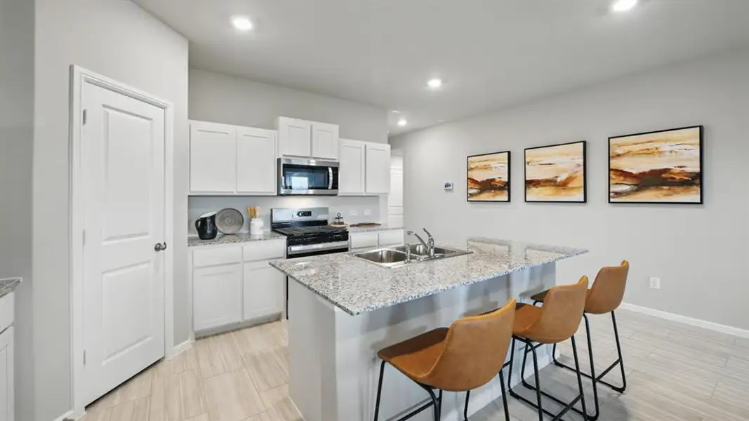 Kitchen-All Home and community information, including pricing, included features, terms, availability and amenities, are subject to change at any time without notice or obligation. All Drawings, pictures, photographs, video, square footages, floor plans, elevations, features, colors and sizes are approximate for illustration purposes only and will vary from the homes as built.