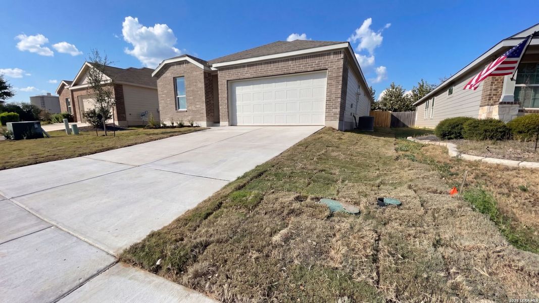 Front exterior of a new home in Waterwheel, San Antonio, TX, highlighting curb appeal (Image 18).
