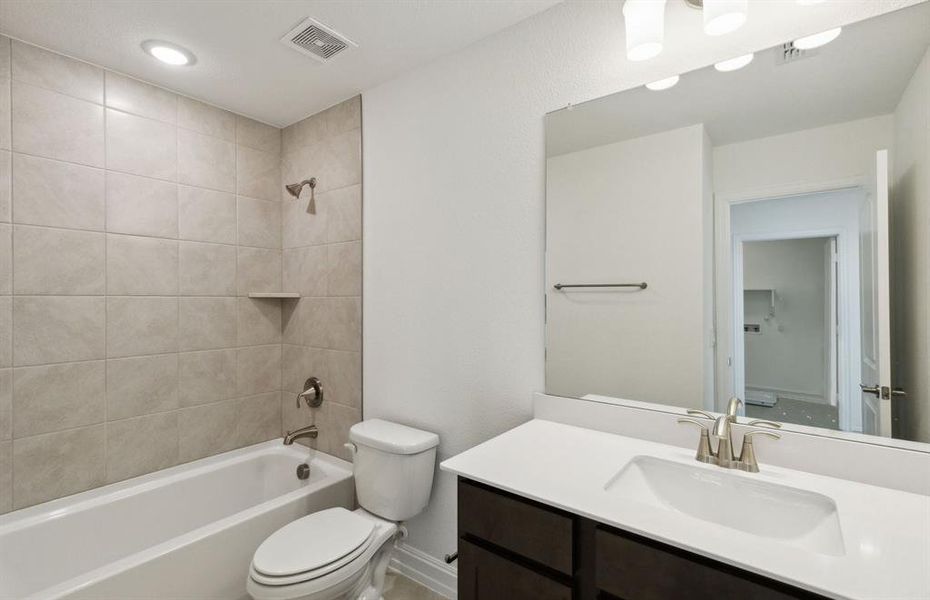 Upgraded secondary bathroom*real home pictured