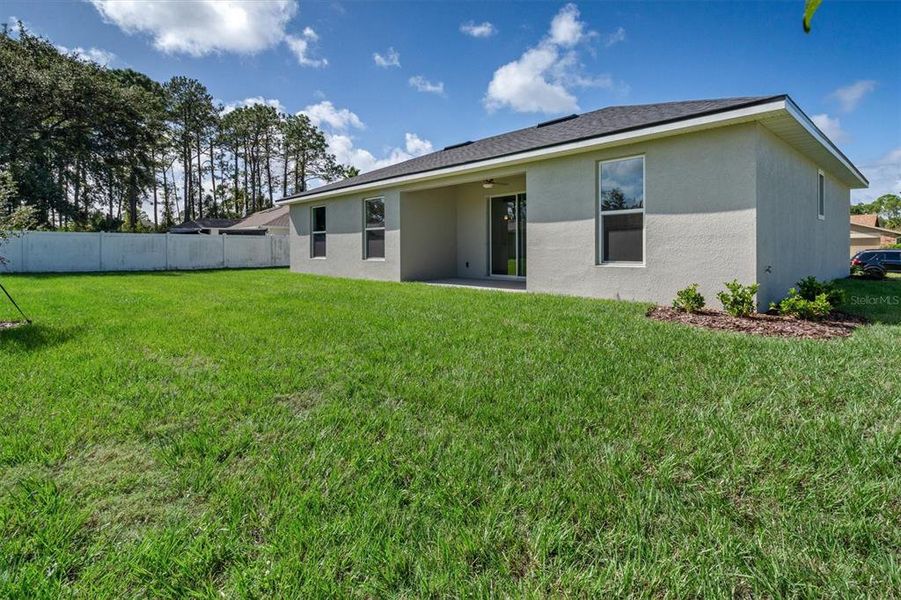 Exterior details and patio area of a home in , Palm Coast (Image 24).