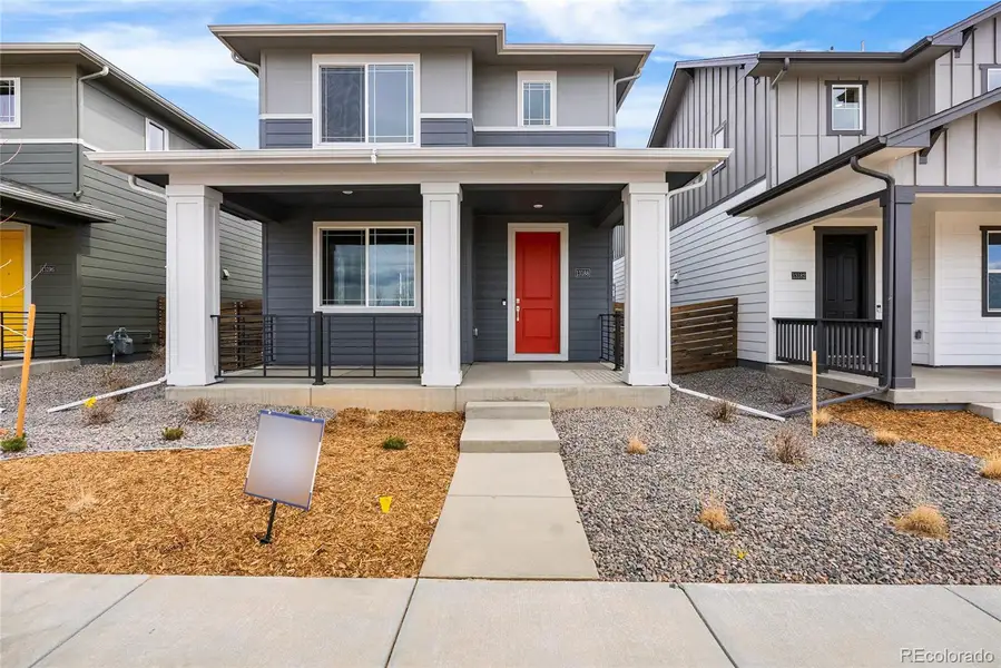 Exterior details and patio area of a home in Barefoot Village, Firestone (Image 22).