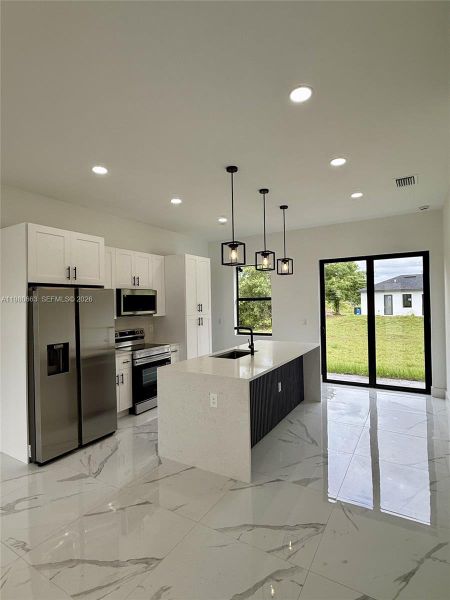 Furnished interior view inside a new home in , Lehigh Acres (Image 3).