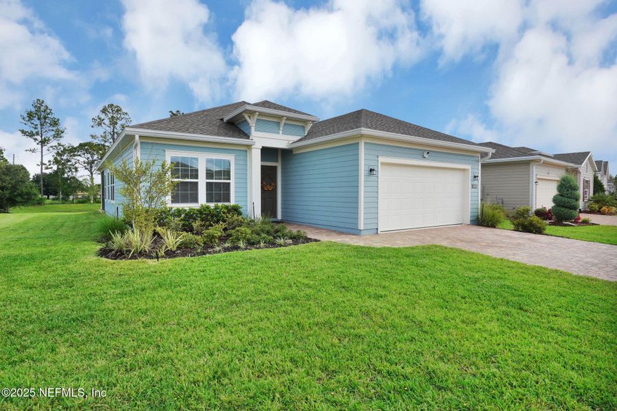 Front exterior of a new home in , Jacksonville, FL, highlighting curb appeal (Image 26).