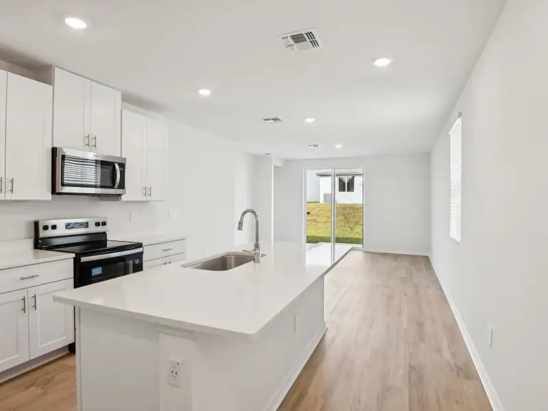 Furnished interior view inside a new home in Salt Meadows - Premier Series, Parrish (Image 4).