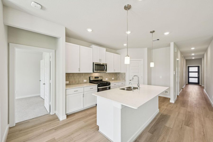 Furnished interior view inside a new home in Landing Meadows - Premier Series, New Caney (Image 14). Furnished interior view inside a new home in Landing Meadows - Premier Series, New Caney (Image 14).