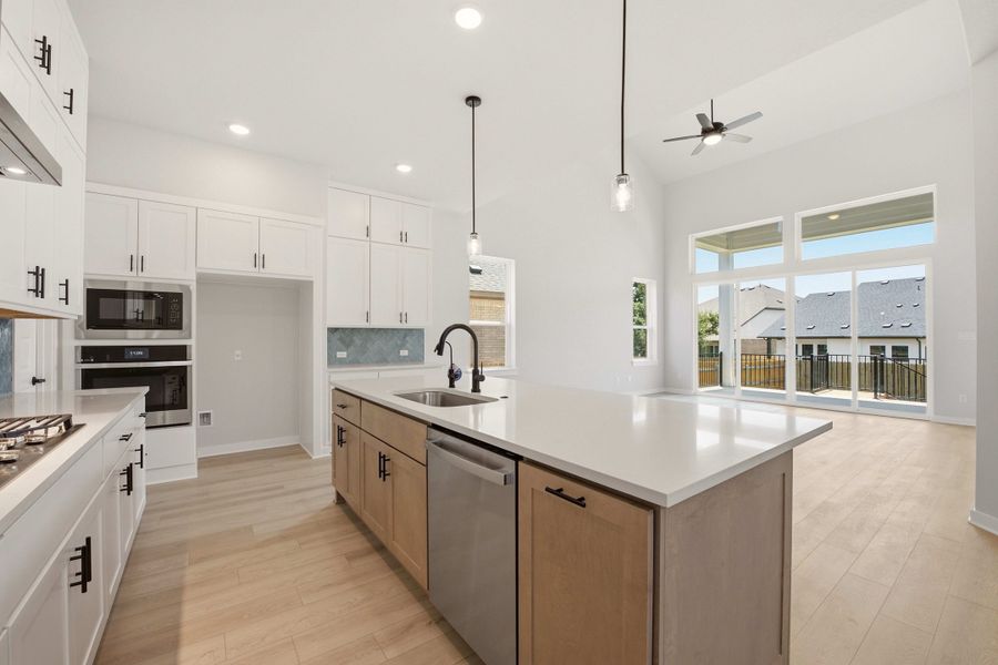 Furnished interior view inside a new home in Heritage, Dripping Springs (Image 13).