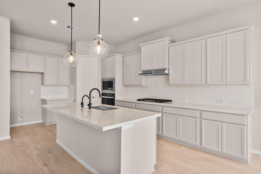 Furnished interior view inside a new home in Bridgeland, Cypress (Image 9).
