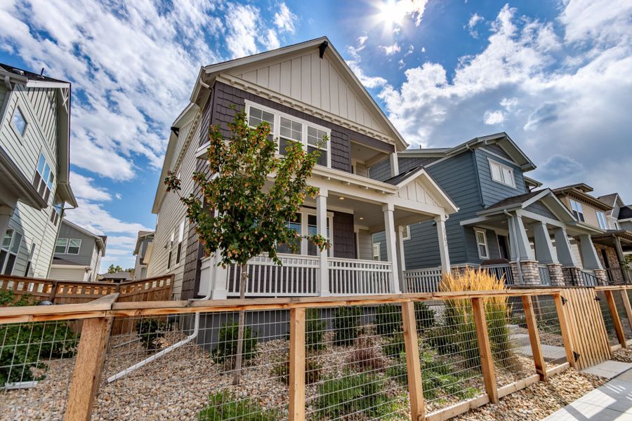 Front exterior of a new home in Arras Park, Thornton, CO, highlighting curb appeal (Image 25). Front exterior of a new home in Arras Park, Thornton, CO, highlighting curb appeal (Image 25).