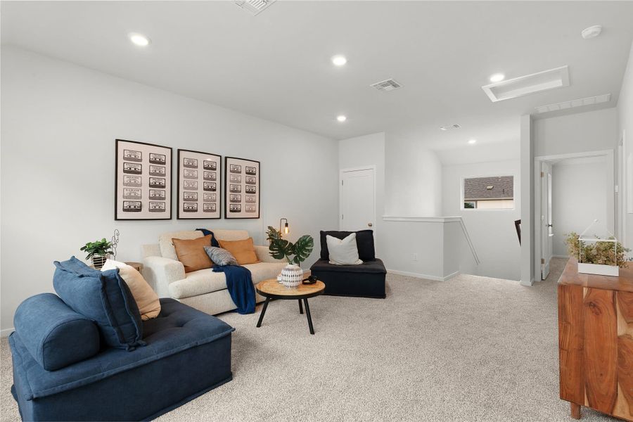 Representative furnished interior of a home built from the Wilson by Chesmar Homes in Deerbrooke Cottages, Leander (Image 12).
