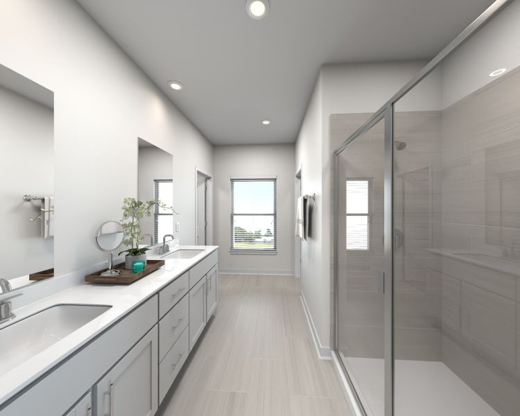 The primary bathroom offers dual vanity sinks and a walk-in closet.