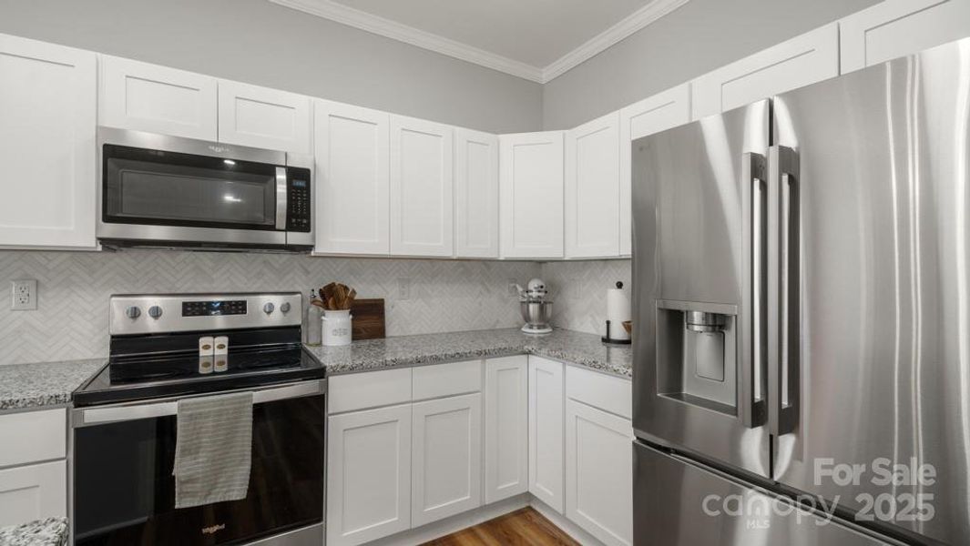 Furnished interior view inside a new home in , Kernersville (Image 26).
