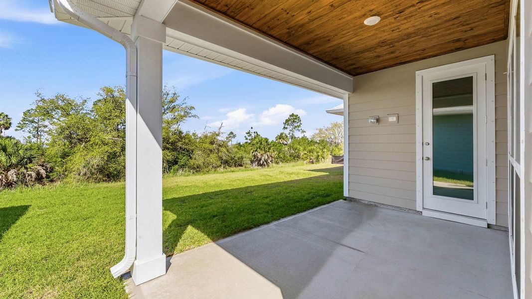 Exterior details and patio area of a home in WindMark Beach, Port Saint Joe (Image 21).