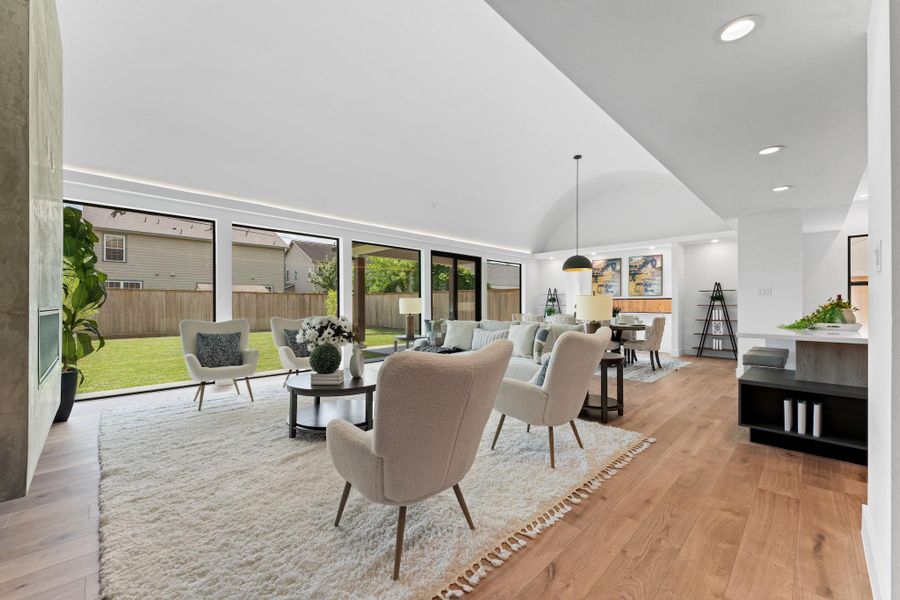 Soaring barrel-arched ceilings and a wall of glass bring a breathtaking sense of space and light to everyday living. Soaring barrel-arched ceilings and a wall of glass bring a breathtaking sense of space and light to everyday living.