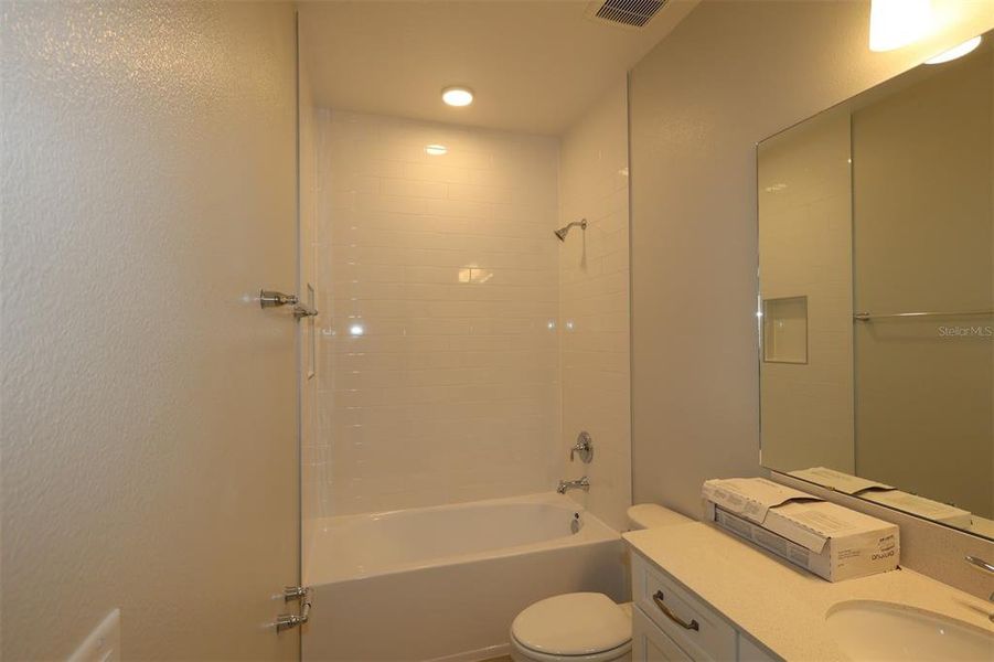 Furnished interior view inside a new home in Solace at Corner Lake, Orlando (Image 9).