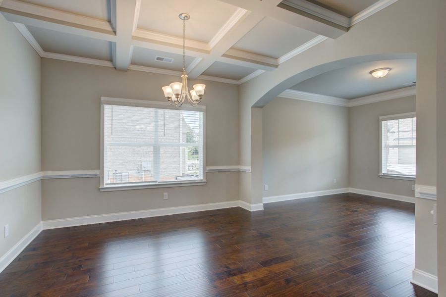 The formal dining room is connected to the front living or office space