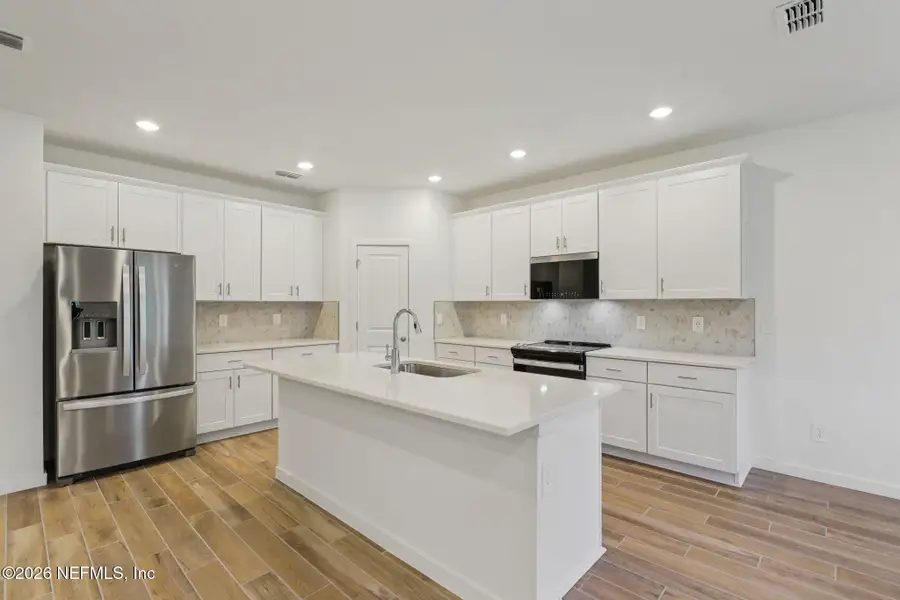 Furnished interior view inside a new home in Cypress Meadows - Signature Series, Jacksonville (Image 6).