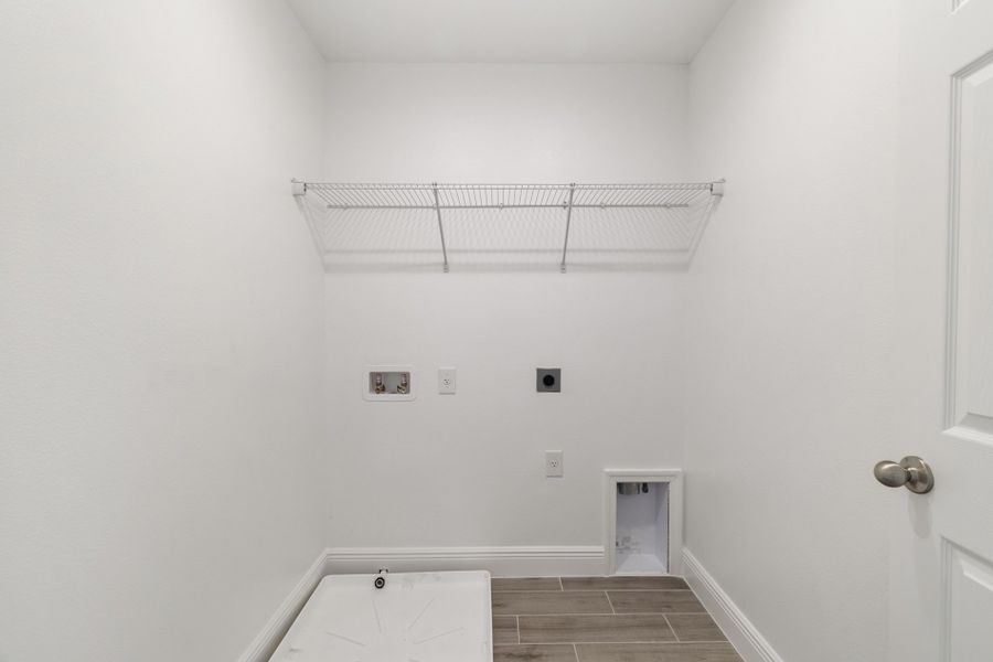 Representative unfurnished interior of a home built from the Newcastle by Risewell Homes in Park View at the Hills, Minneola (Image 8).