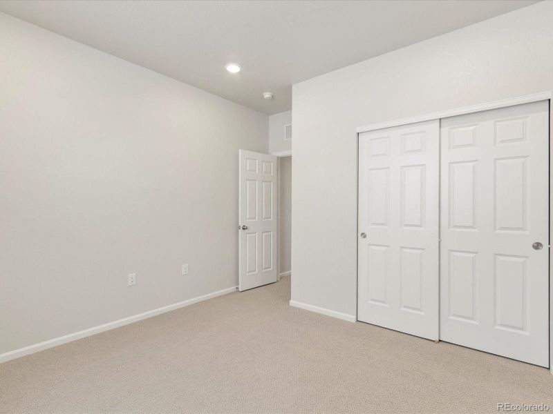 Spacious, unfurnished interior of a new home in Poudre Heights: The Alpine Collection, Windsor (Image 36).