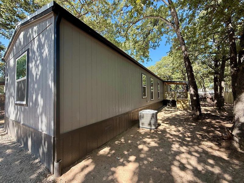 Exterior details and patio area of a home in , Pelican Bay (Image 18). Exterior details and patio area of a home in , Pelican Bay (Image 18).