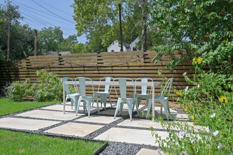 Patio area at corner of yard Patio area at corner of yard
