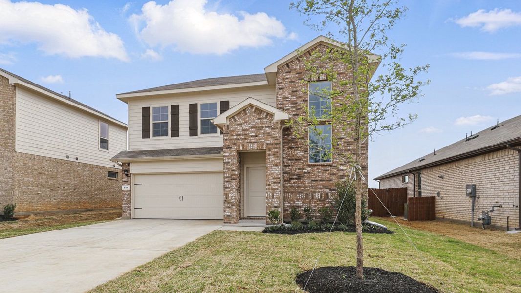 Representative exterior photo of a completed home built from the MACON by D.R. Horton in Springhill South, Boyd, TX (Image 19). Representative exterior photo of a completed home built from the MACON by D.R. Horton in Springhill South, Boyd, TX (Image 19).