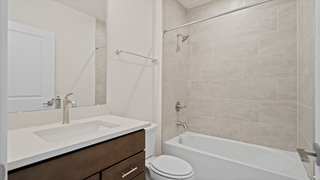 The Atwood Guest Bathroom by DRB Homes in Hamilton Bluff, Haines City, FL The Atwood Guest Bathroom by DRB Homes in Hamilton Bluff, Haines City, FL