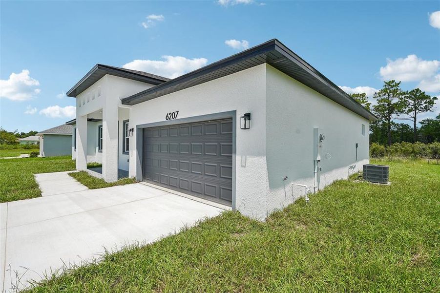 Front exterior of a new home in , Ocala, FL, highlighting curb appeal (Image 22). Front exterior of a new home in , Ocala, FL, highlighting curb appeal (Image 22).
