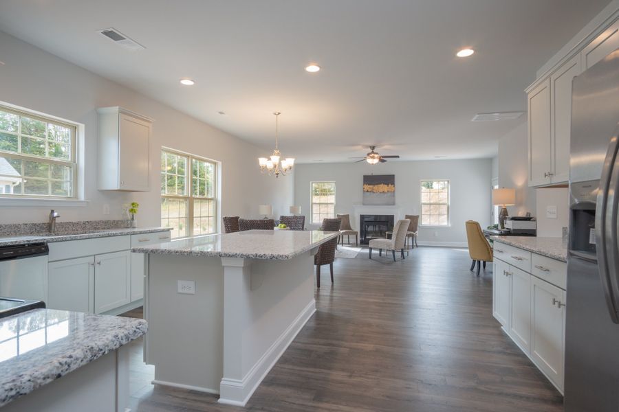 Representative furnished interior of a home built from the 3030 by Adams Homes in Parkland Place, Pace (Image 6).