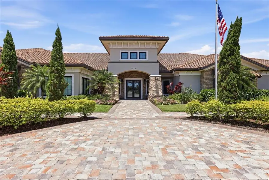 Front exterior of a new home in , Palmetto, FL, highlighting curb appeal (Image 21). Front exterior of a new home in , Palmetto, FL, highlighting curb appeal (Image 21).