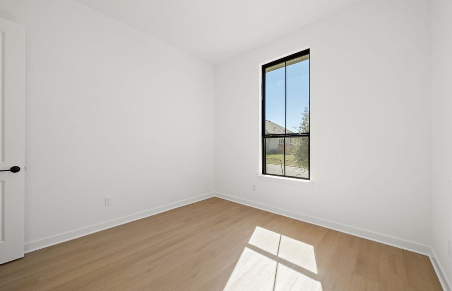 Spacious, unfurnished interior of a new home in 6 Creeks, Kyle (Image 43).
