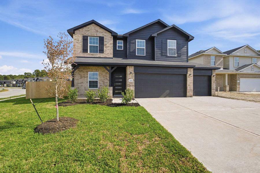 Front exterior of a new home in Pecan Estates, Crosby, TX, highlighting curb appeal (Image 27).