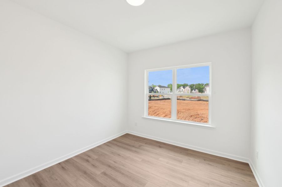 Representative unfurnished interior of a home built from the Alexis by Ashton Woods in Rowland's Grant, Fuquay Varina (Image 30).