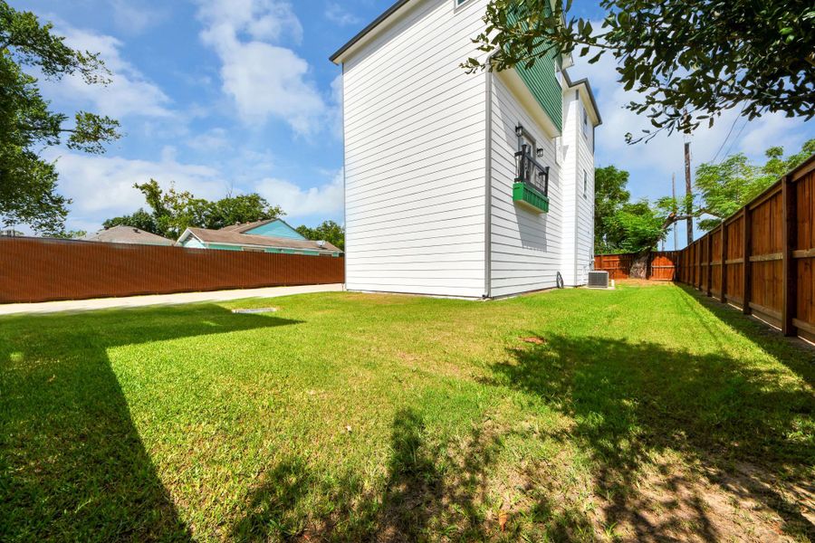 Exterior details and patio area of a home in , Houston (Image 4).