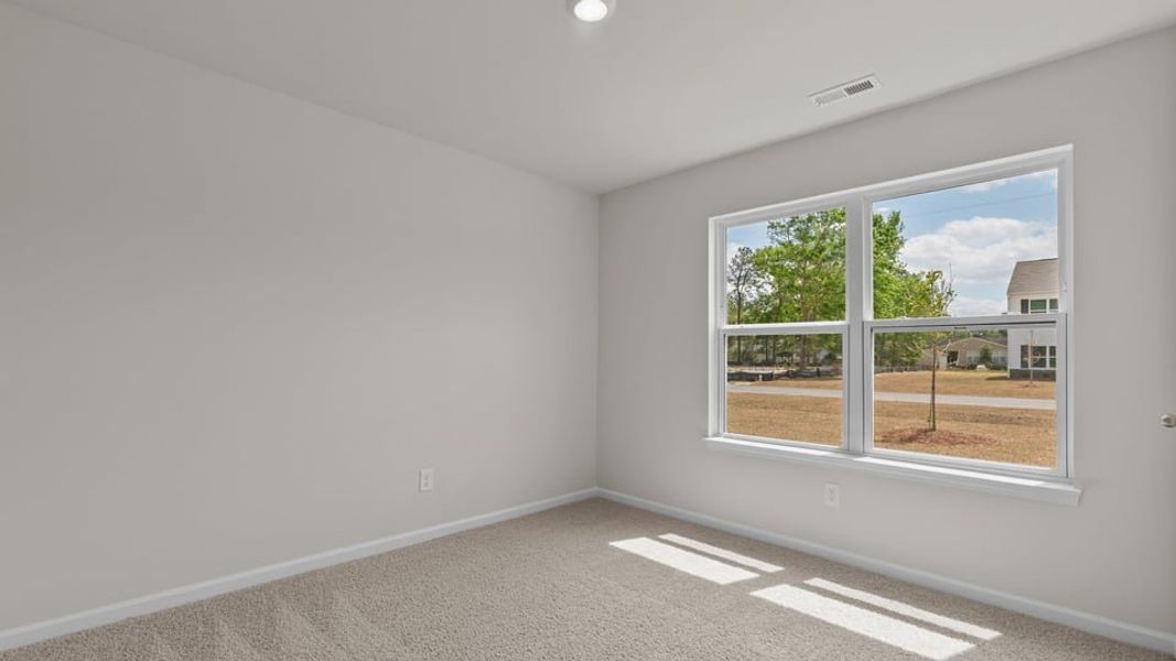 Representative unfurnished interior of a home built from the Cali by D.R. Horton in Hobbs Farm, Ayden (Image 15).