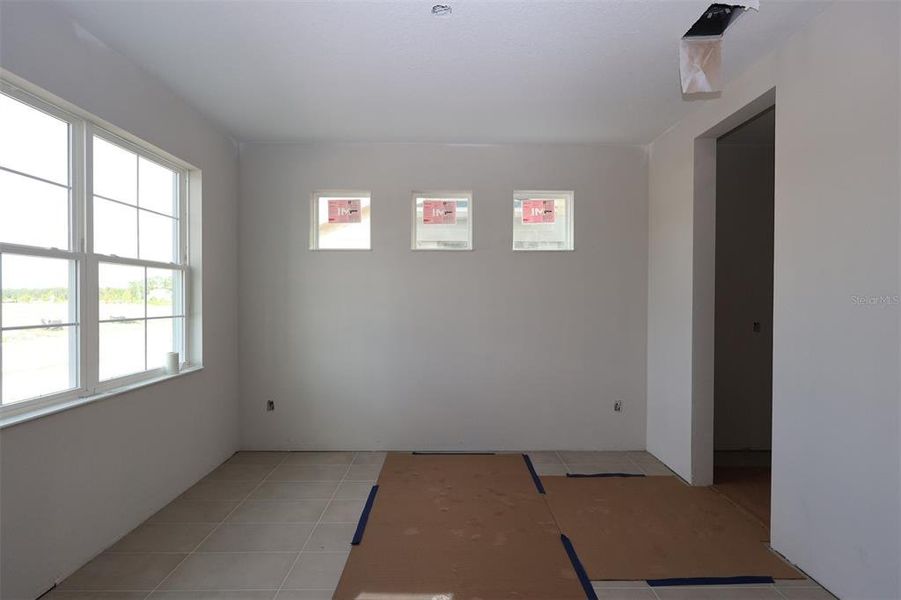 In-progress construction of a new home in Center Lake on the Park, St. Cloud, FL (Image 28).