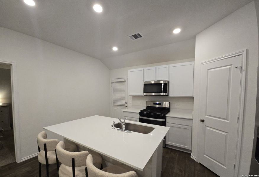 Furnished interior view inside a new home in , Kyle (Image 17).