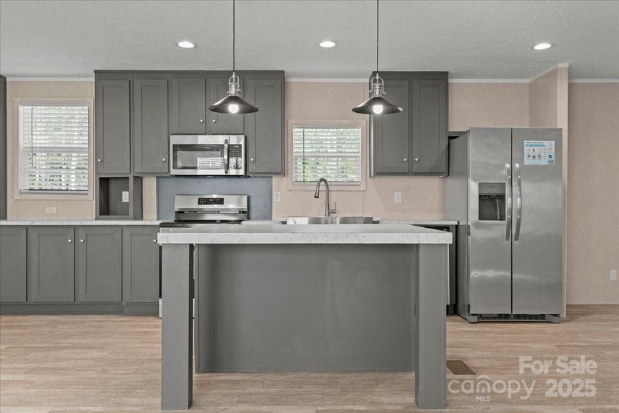 Furnished interior view inside a new home in , Ruby (Image 9). Furnished interior view inside a new home in , Ruby (Image 9).