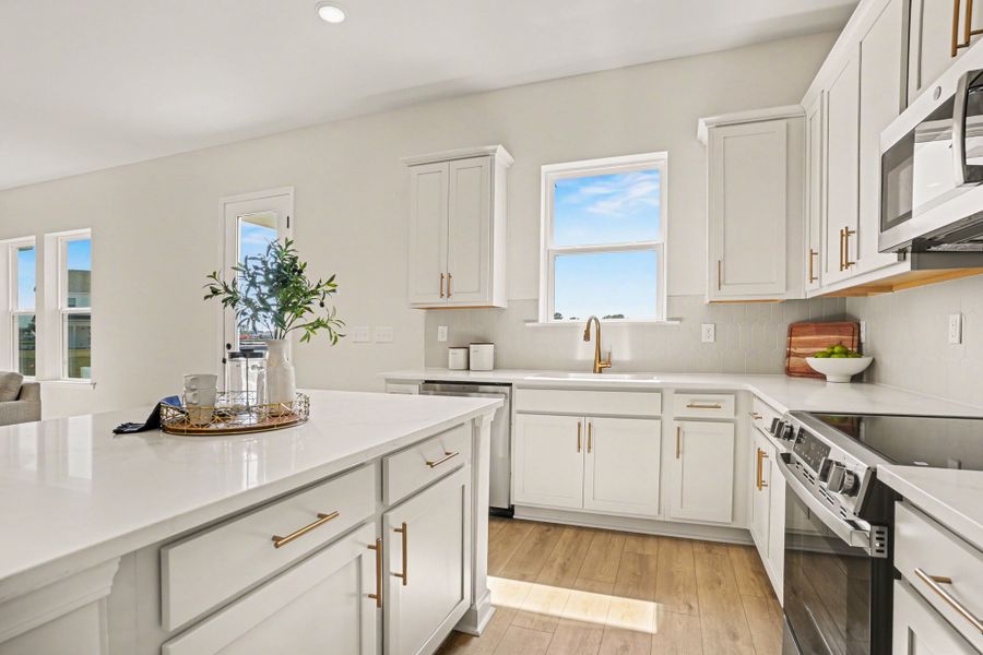Representative furnished interior of a home built from the Sedona - Waterway by Ashton Woods in Blue Heron Retreat, Little River (Image 8).