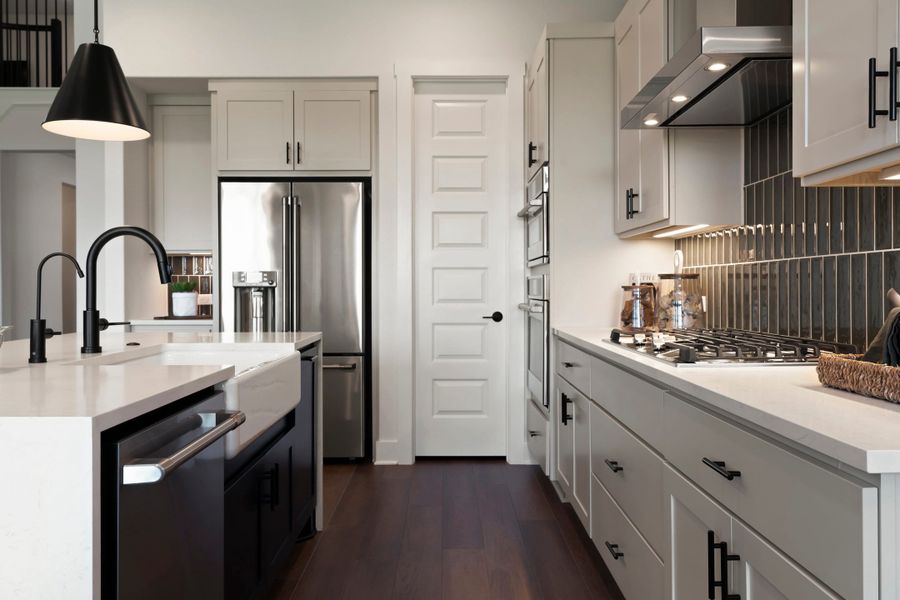 Furnished interior view inside a new home in Lagos Reserve, Manor (Image 24).